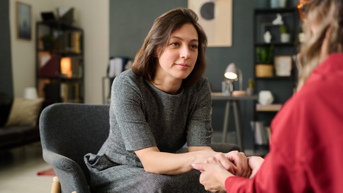 A woman finds relief through a personalized individual treatment session.