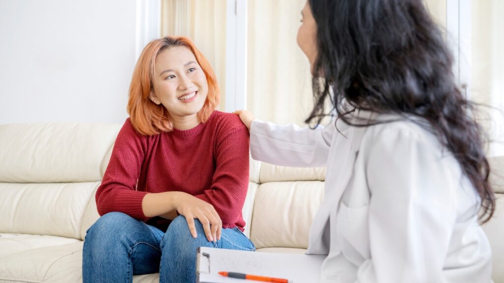 A young woman feels relief after learning coping mechanisms for ADHD during Teen ADHD treatment in Raleigh, NC